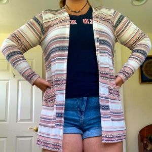 Long cute cardigen. Looks good with everything.